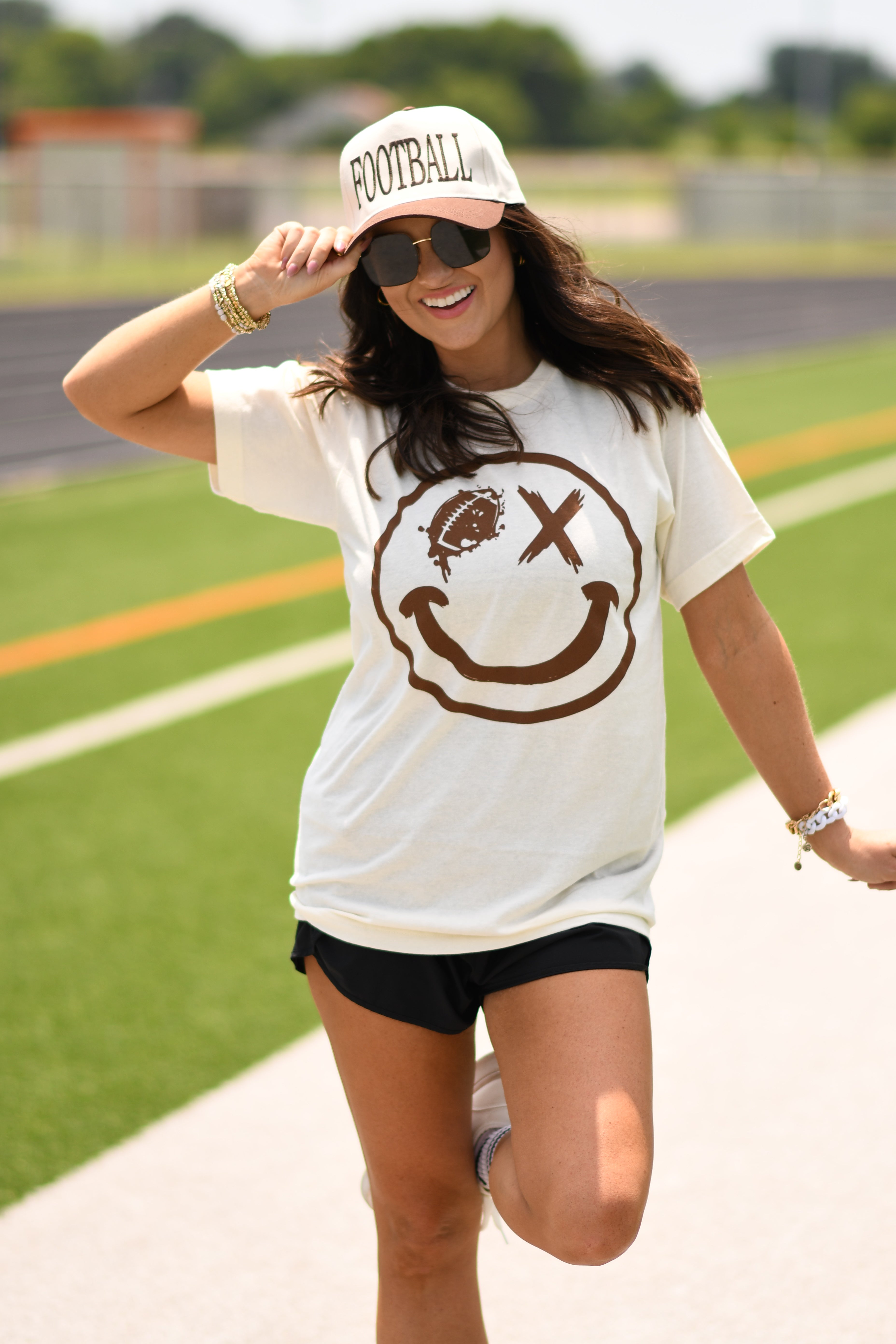FOOTBALL WINK SMILEY TEE