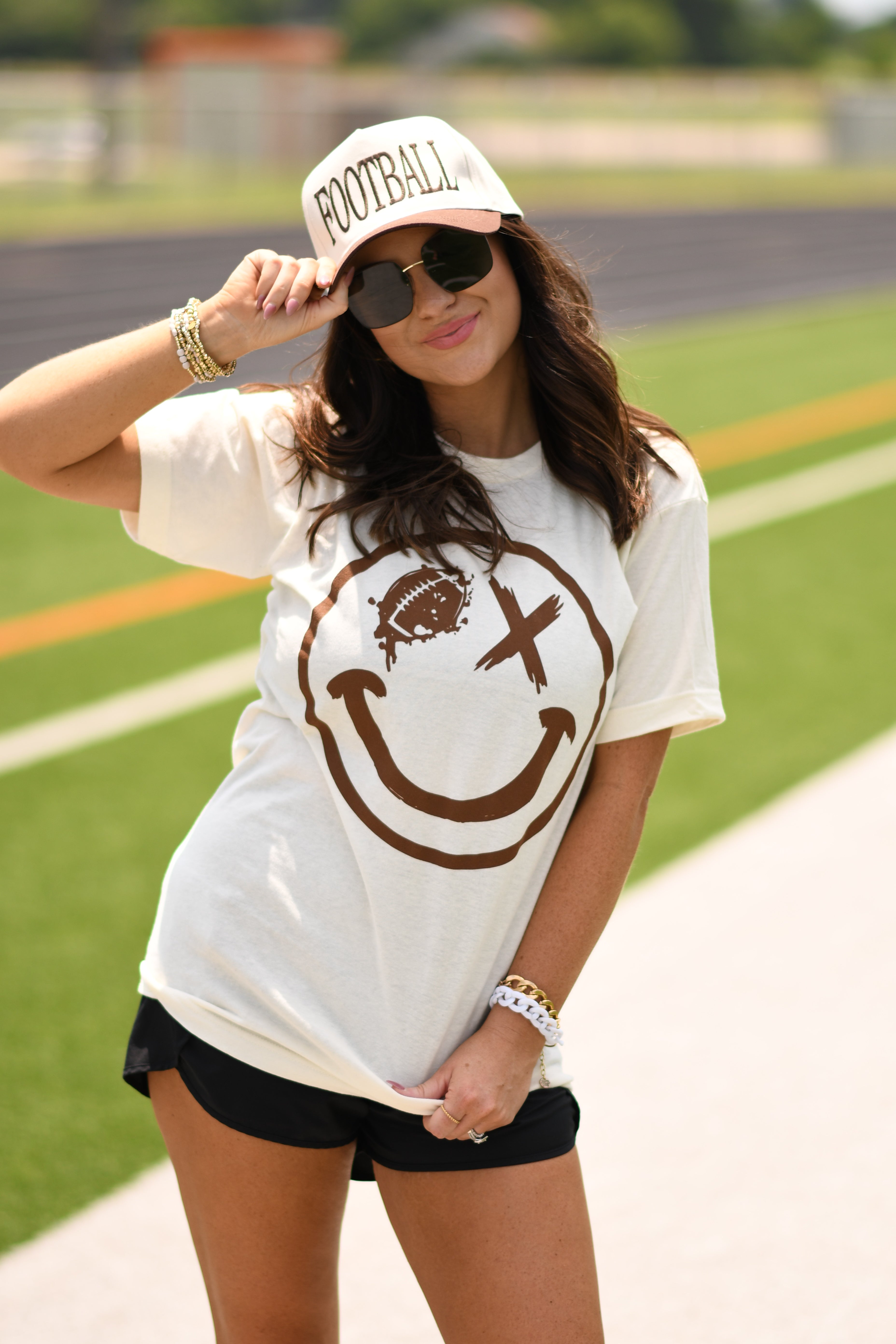 FOOTBALL WINK SMILEY TEE