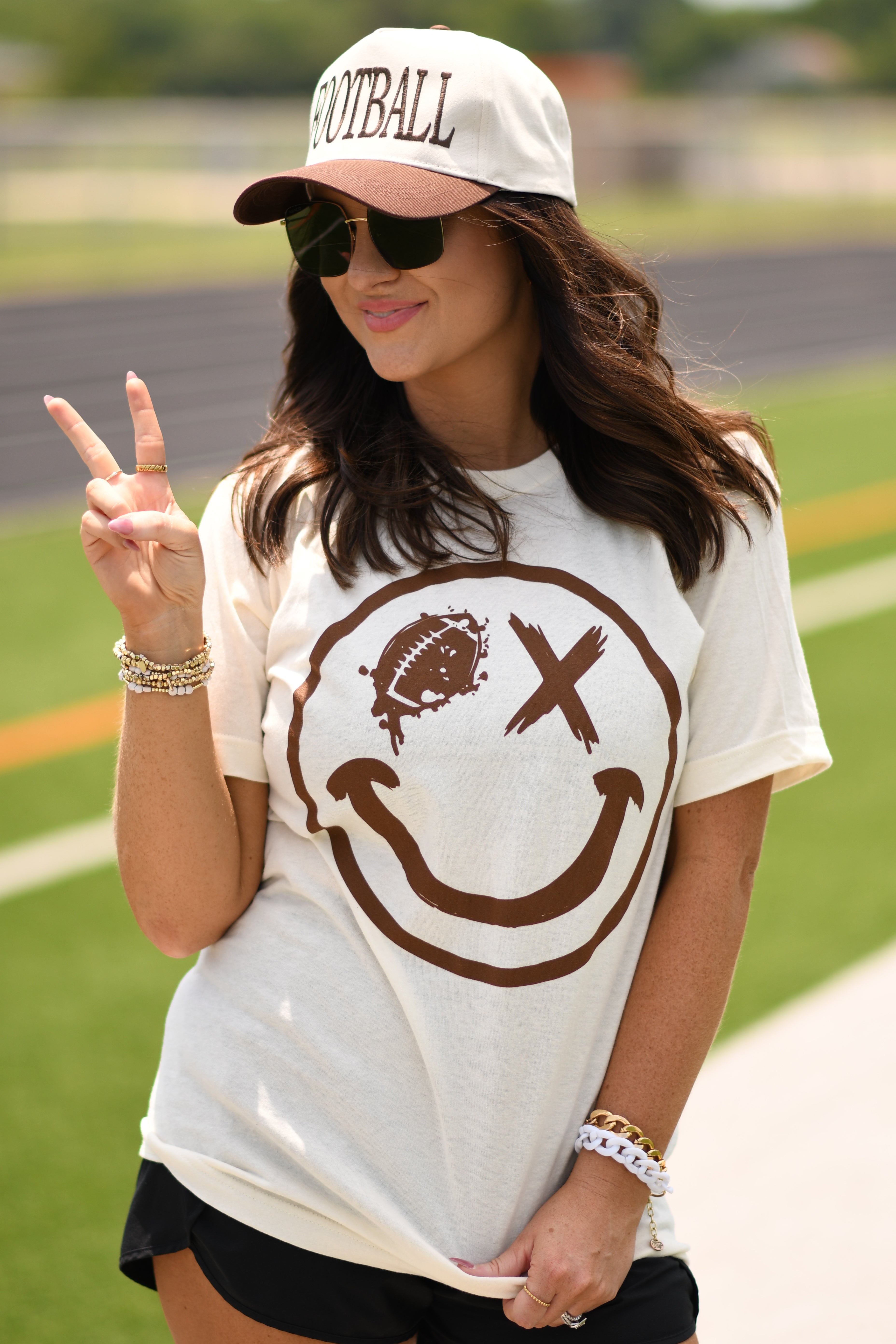 FOOTBALL WINK SMILEY TEE