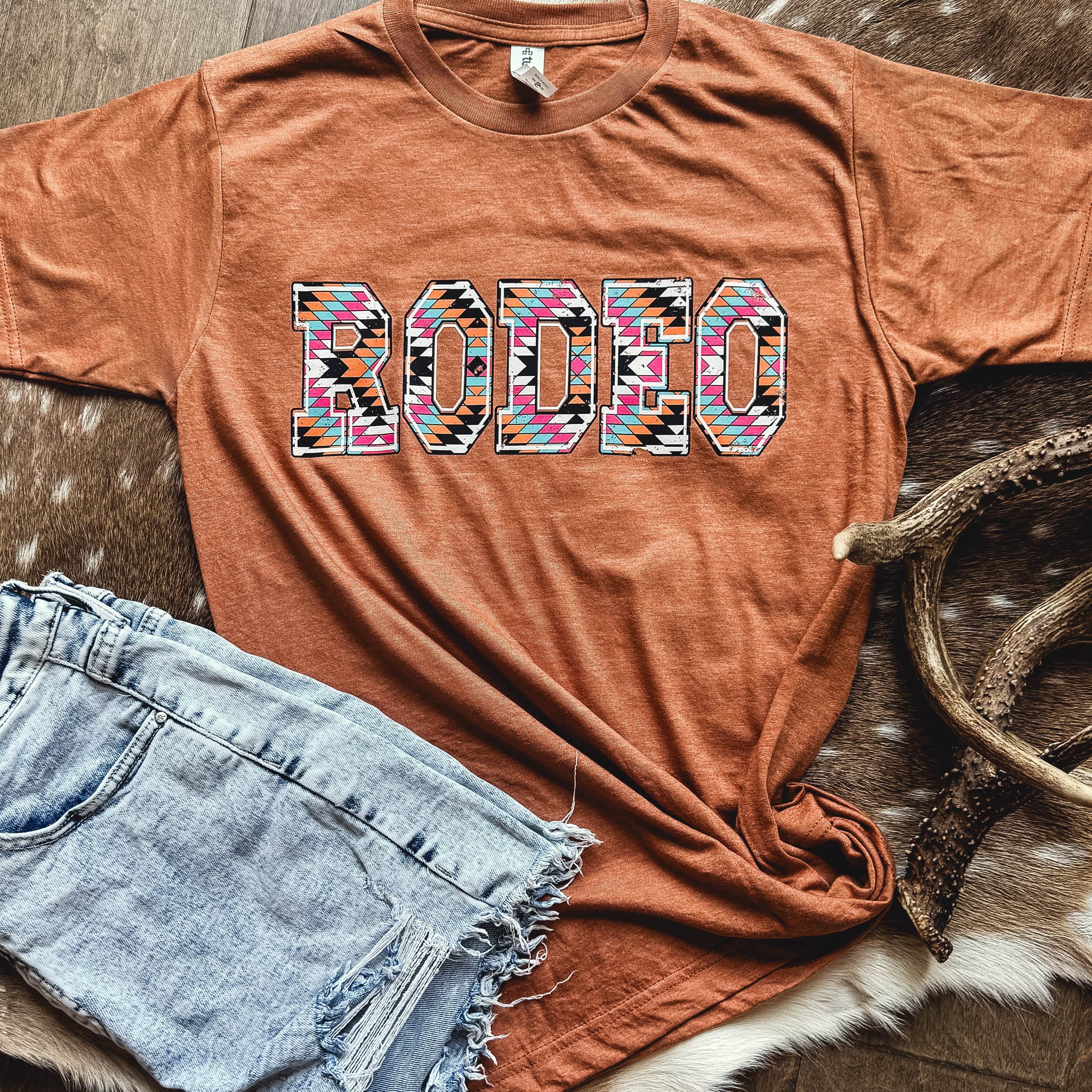 Women - Apparel - Shirts - T-Shirts Rodeo Aztec Block Letter Graphic Tee