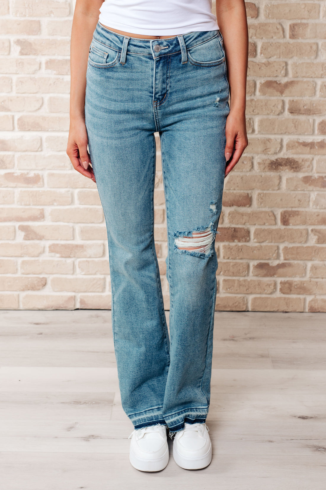 Denim Isla Mid Rise Distressed Released Hem Bootcut Jeans