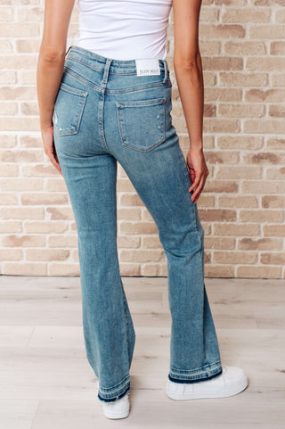 Denim Isla Mid Rise Distressed Released Hem Bootcut Jeans