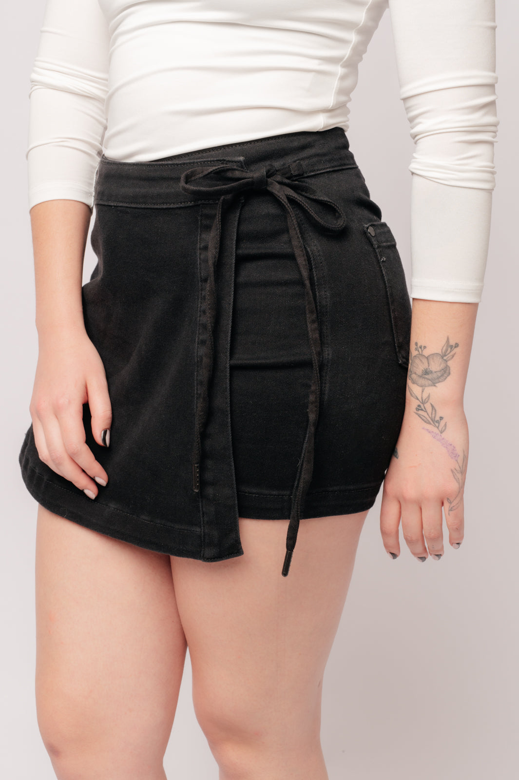 Denim Bentli High Rise Side Tie Denim Skort in Black