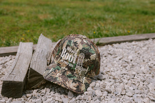 Hat We'll Put A Boot in your Ass - Camo Trucker Hat
