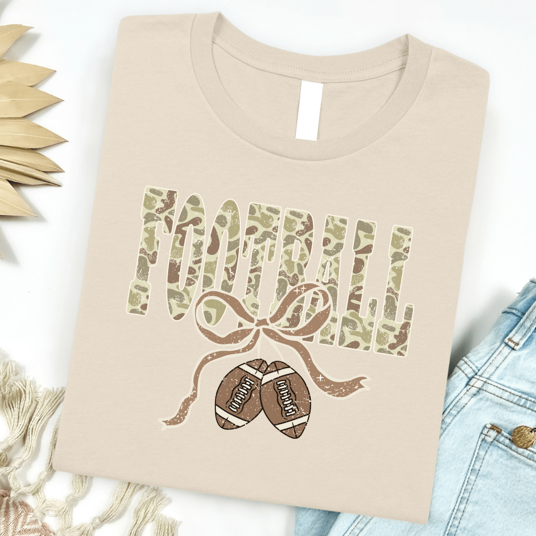 Women - Apparel - Shirts - T-Shirts Camo Football Ribbon Graphic Tee